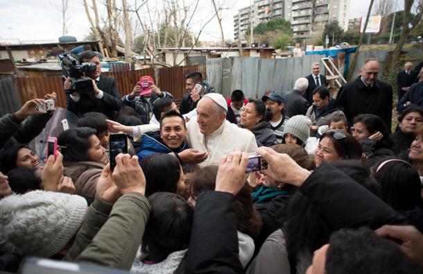 Pope Francis visits a refugee camp in Rome