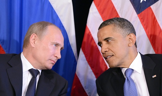US President Barack Obama (R) listens to Russian President Vladimir Putin after their bilateral meeting in Los Cabos, Mexico on June 18, 2012 on the sidelines of the G20 summit. Obama and President Vladimir Putin met Monday, for the first time since the Russian leader's return to the presidency, for talks overshadowed by a row over Syria. The closely watched meeting opened half-an-hour late on the sidelines of the G20 summit of developed and developing nations, as the US leader sought to preserve his "reset" of ties with Moscow despite building disagreements. AFP PHOTO/Jewel Samad (Photo credit should read JEWEL SAMAD/AFP/GettyImages)