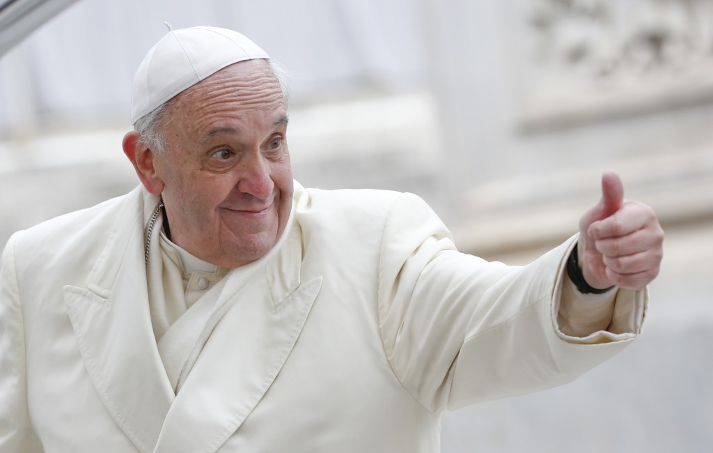 Pope Francis gives the thumbs up during his general audience in St. Peter's Square at the Vatican Jan. 29. (CNS photo/Tony Gentile, Reuters) (Jan. 29, 2014) See POPE-AUDIENCE Jan. 29, 2014.