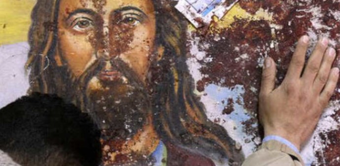 Cristo-murales-macchiato-di-sangue1-940x250