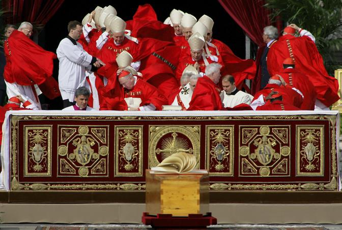 REUTERS PICTURES OF THE DECADE. Cardinals' cassocks are blown by a gust of wind as they arrive for the funeral mass of the Pope John Paul II at St. Peter's Basilica in the Vatican April 8, 2005. REUTERS/Max Rossi (VATICAN)