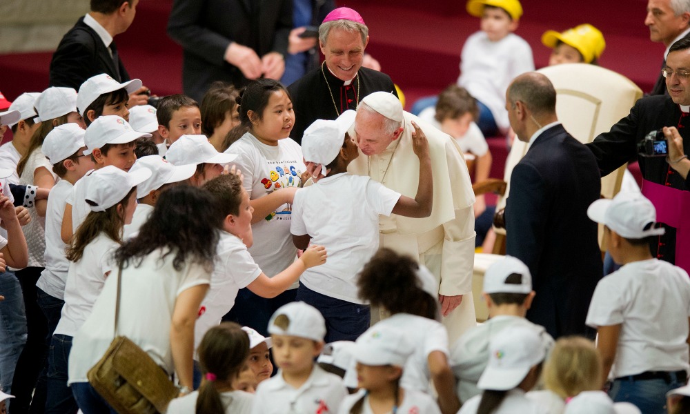 11/05/2015 Citta' del Vaticano, udienza del papa alla Fabbrica della Pace. Nella foto papa Francesco in mezzo ai bambini