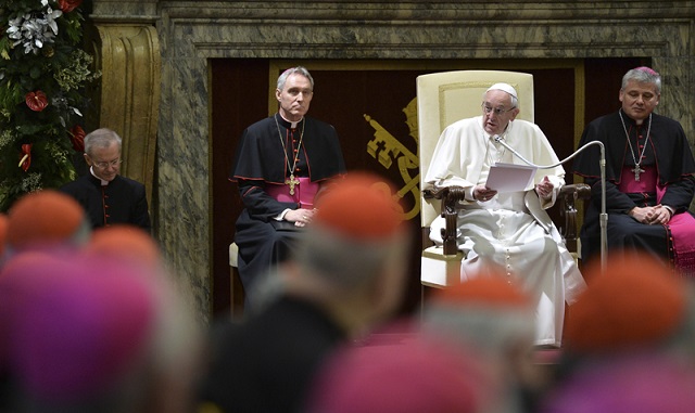 Pope Francis speaks during the traditional greetings to the Roman Curia in the Sala Clementina (Clementine Hall) of the Apostolic Palace, at the Vatican on December 21, 2015. Photo courtesy of REUTERS/Alberto Pizzoli/Pool *Editors: This photo may only be republished wtih RNS-POPE-CURIA, originally transmitted on Dec. 21, 2015.