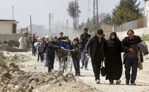 civili in fuga dalla siria