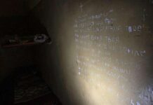 La preghiera scritta sul muro della cella - Ansa